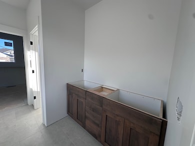 Bathroom featuring light tile patterned floors