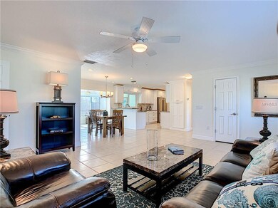 View towards dining and kitchen from living room.
