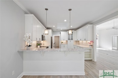 Kitchen w/Stainless Steel Appliances, White Shaker
