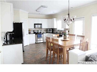 Open Kitchen with new tile floors, stainless steel