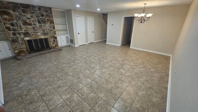 Unfurnished living room with tile patterned floors