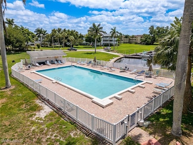 Huge Community Heated Pool overlooking Gulf Access