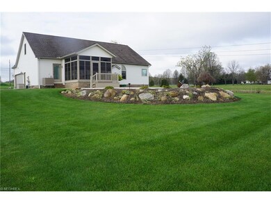 The landscaping is lovely. The 3 season room has a
