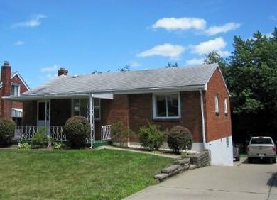 Exterior Front. Large Concrete Drive