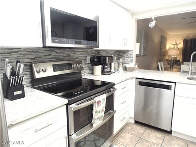 Kitchen with appliances with stainless steel finis