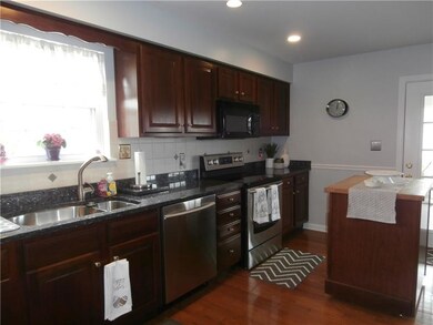 Spacious, gorgeous kitchen with cherry cabinets, g