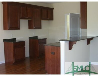 Interior Space/Layout. Kitchen with granite counte