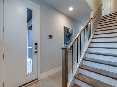 Staircase featuring carpet flooring and recessed lighting