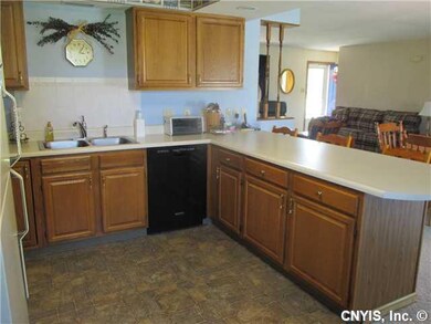 Kitchen. The kitchen opens nicely...,making it con
