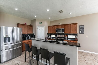 Enjoyable kitchen with walk in pantry.