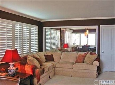 Living room is open and bright.