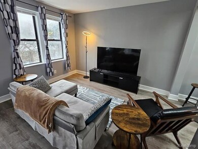 Living area with wood finished floors