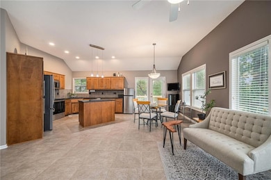 Kitchen and hearth room with tile floors
