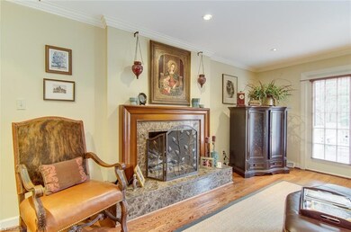 Den has hardwood floors and spacious to accommodate your family