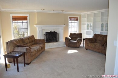 Family Room with Marble Fireplace