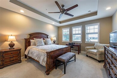 Large master bedroom with peaceful view of the lak