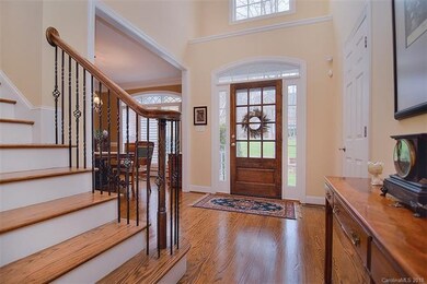 Stunning two-story foyer.  Beautiful wood floors, 