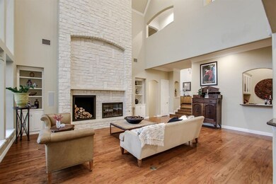 Stunning floor to ceiling stone fireplace.