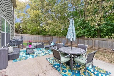 An oversized patio and privacy fence make this a great place to entertain!  Surrounded by trees on both the side & rear, this home site is a rare find!