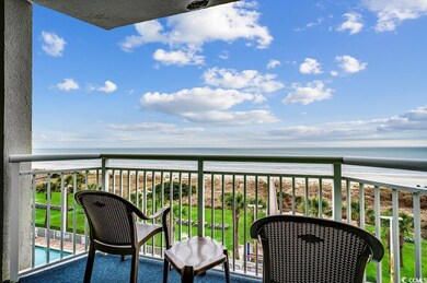 Balcony with a water view and a view of the beach
