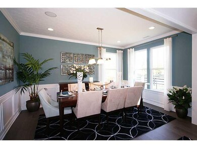 Dining Room. Home is under construction.  Photo is of a similar model.