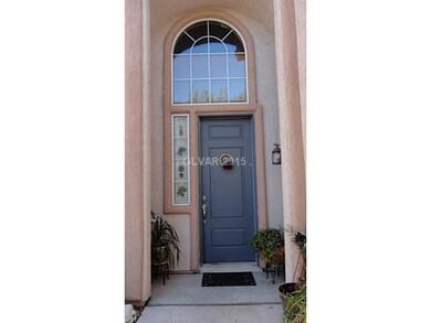 Facade/Exterior Front. Front door with arched wind