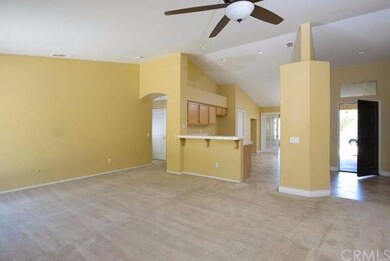 Great room with ceiling fan and Kitchen breakfast 