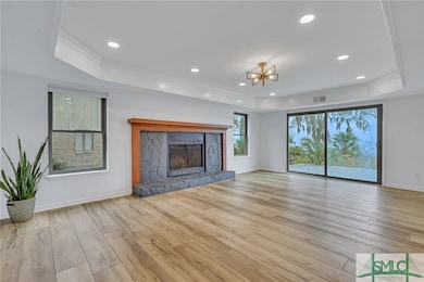 Great Room with Masonary Fireplace with River View