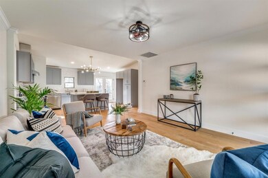 The living room opens directly into the brand-new 