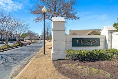 Community sign with a residential view.  There are