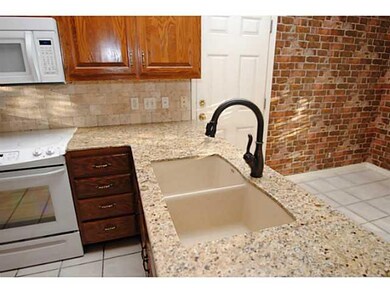 Kitchen. New granite counter tops, fixtures, stove and microwave