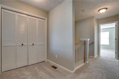 Upstairs hallway and laundry closet.  Washer and Dryer come with the unit!