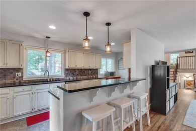 Dining area leading into kitchen