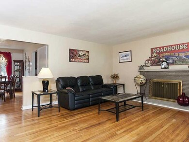 Living Room. Refinished hardwood flooring througho