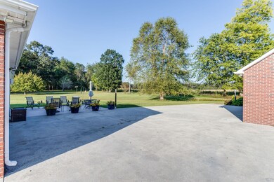 An inviting patio area provides the ideal setting for grilling & outdoor entertaining!