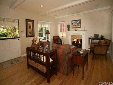 Living room surrounded by windows