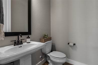 This half-bath is conveniently located near the home office.