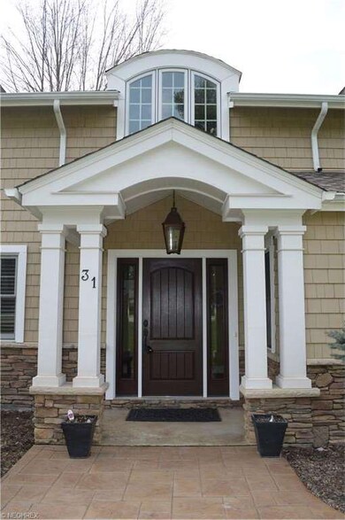 This distinguished home offers custom details thro
