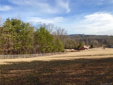 View from upper pasture area looking down to barn