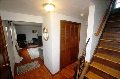 Step inside the foyer w ceramic floor, coat closet