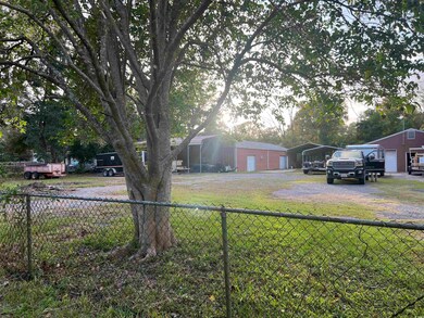 View of yard with a carport