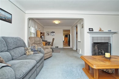 Living room looking into dining area which is curr