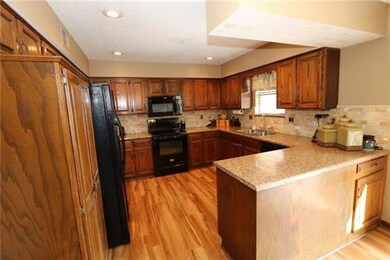 507 S Monroe St, Raymore, MO 64083 - photo 7