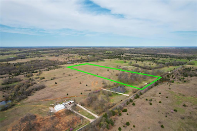 Overview of rural landscape with property boundaries highlighted and a nearby body of water