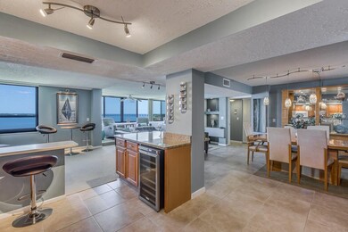 Looking from kitchen to extra large living area an
