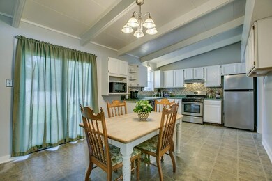 Eat in kitchen opens to patio and dining room.