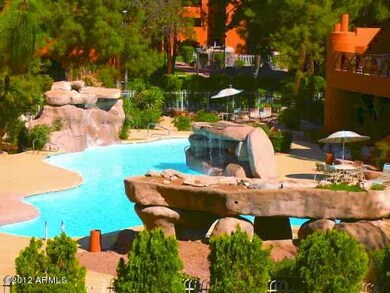 rock formation waterfall at pool