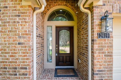 Your welcoming recessed front entrance affords privacy, shelter from the elements and lots of room for home deliveries and welcoming guests!