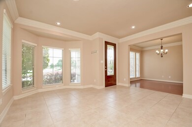 Elegant formal living area with abundant natural l