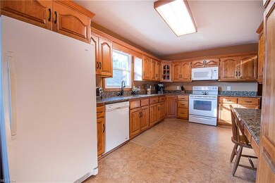 The eat-in kitchen is open and centralized; it is the heart of the home!